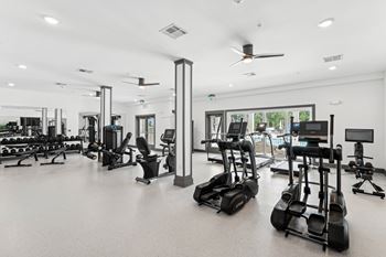 Gym with cardio equipment and weights at The Leo Myrtle Beach, Myrtle Beach, SC